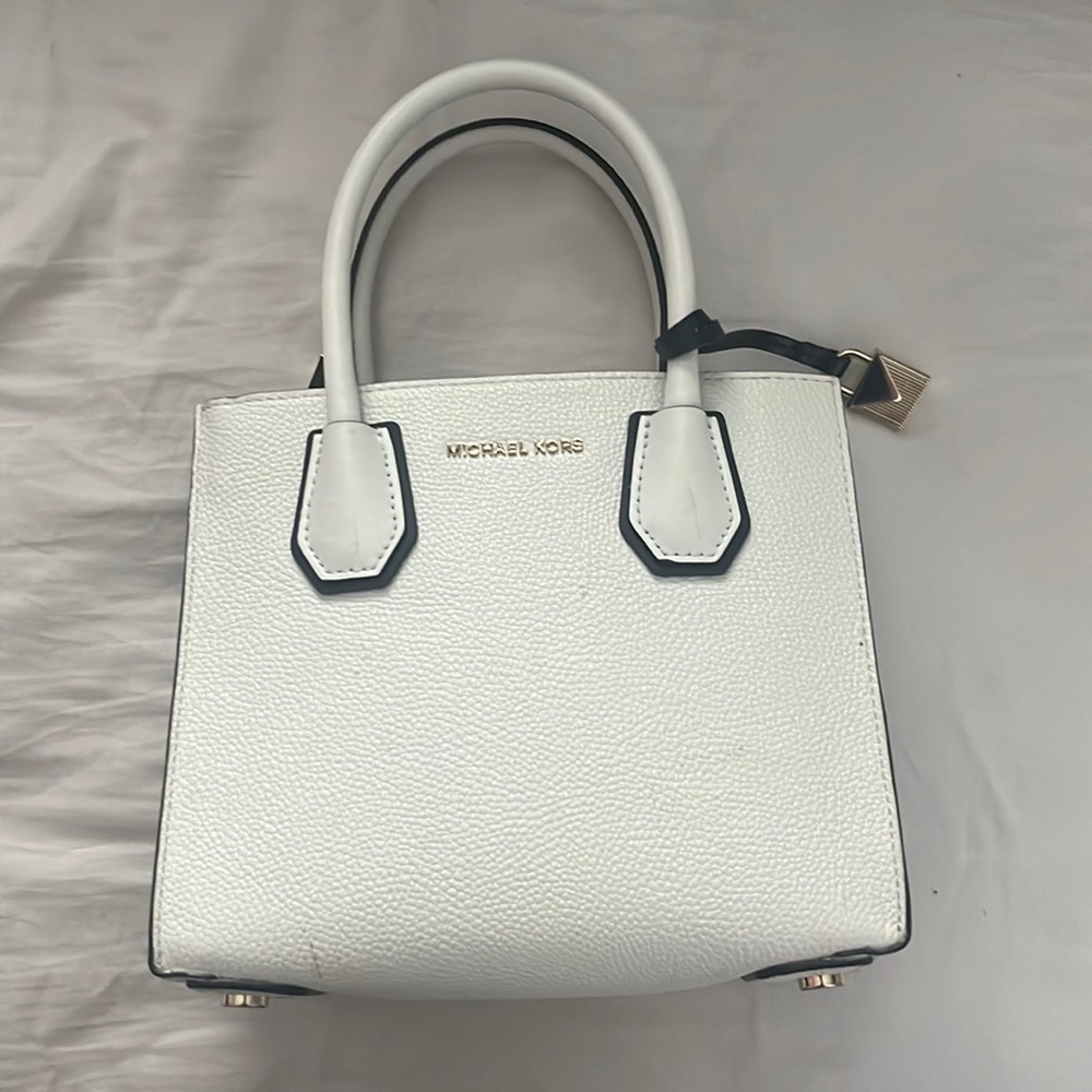 small/medium sized black/white michael kors purse